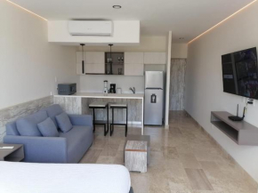 Modern studio with infinity pool Aldea Zama